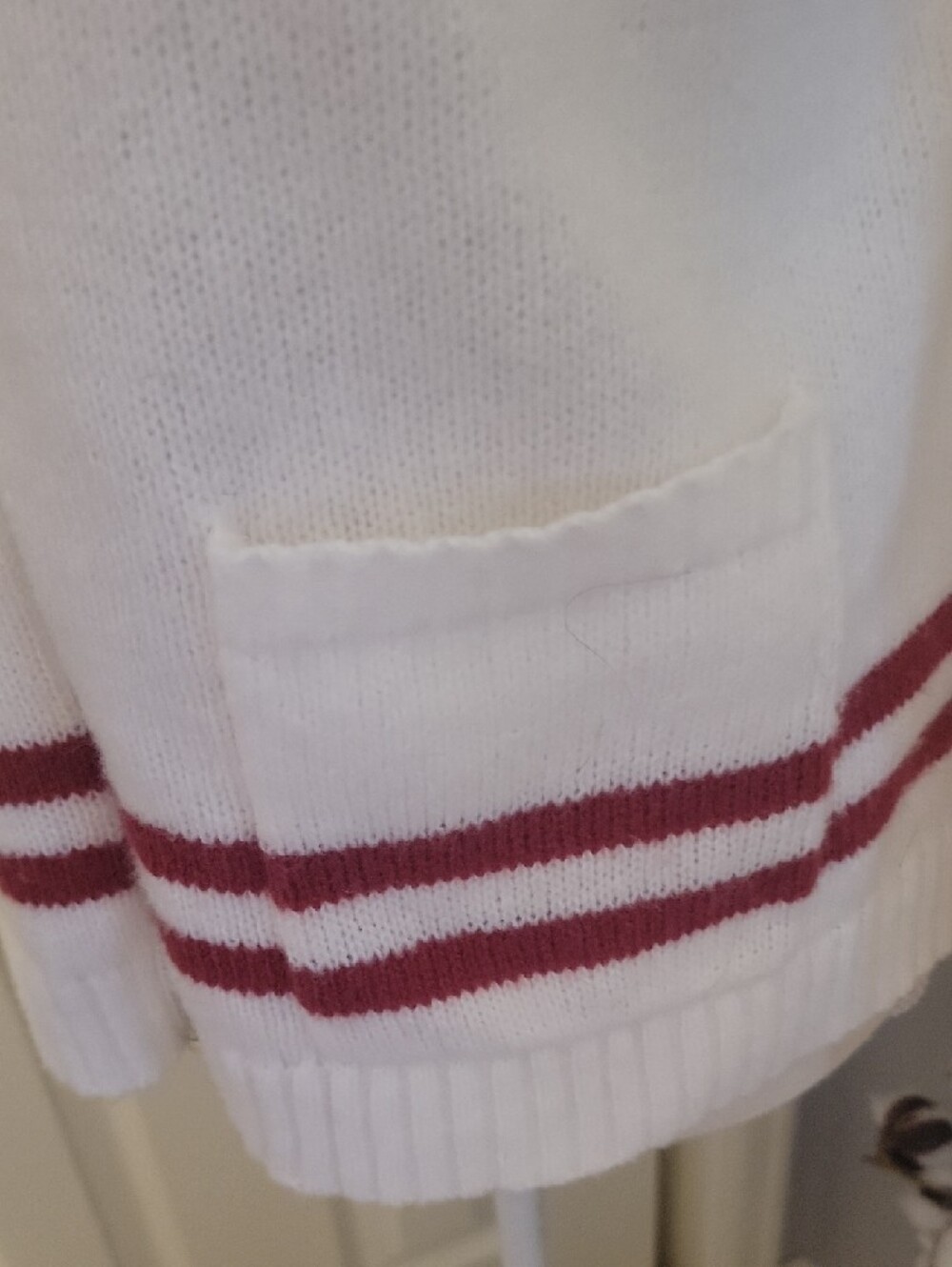 Daisy White Zip-Up Knit Bomber with Pink Bow Details - Picture 3 of 7